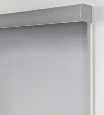 Gray roller blind on window