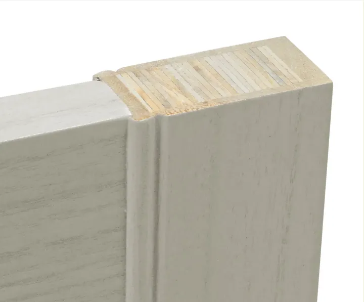 Close-up of cross-sectioned wooden door structure.