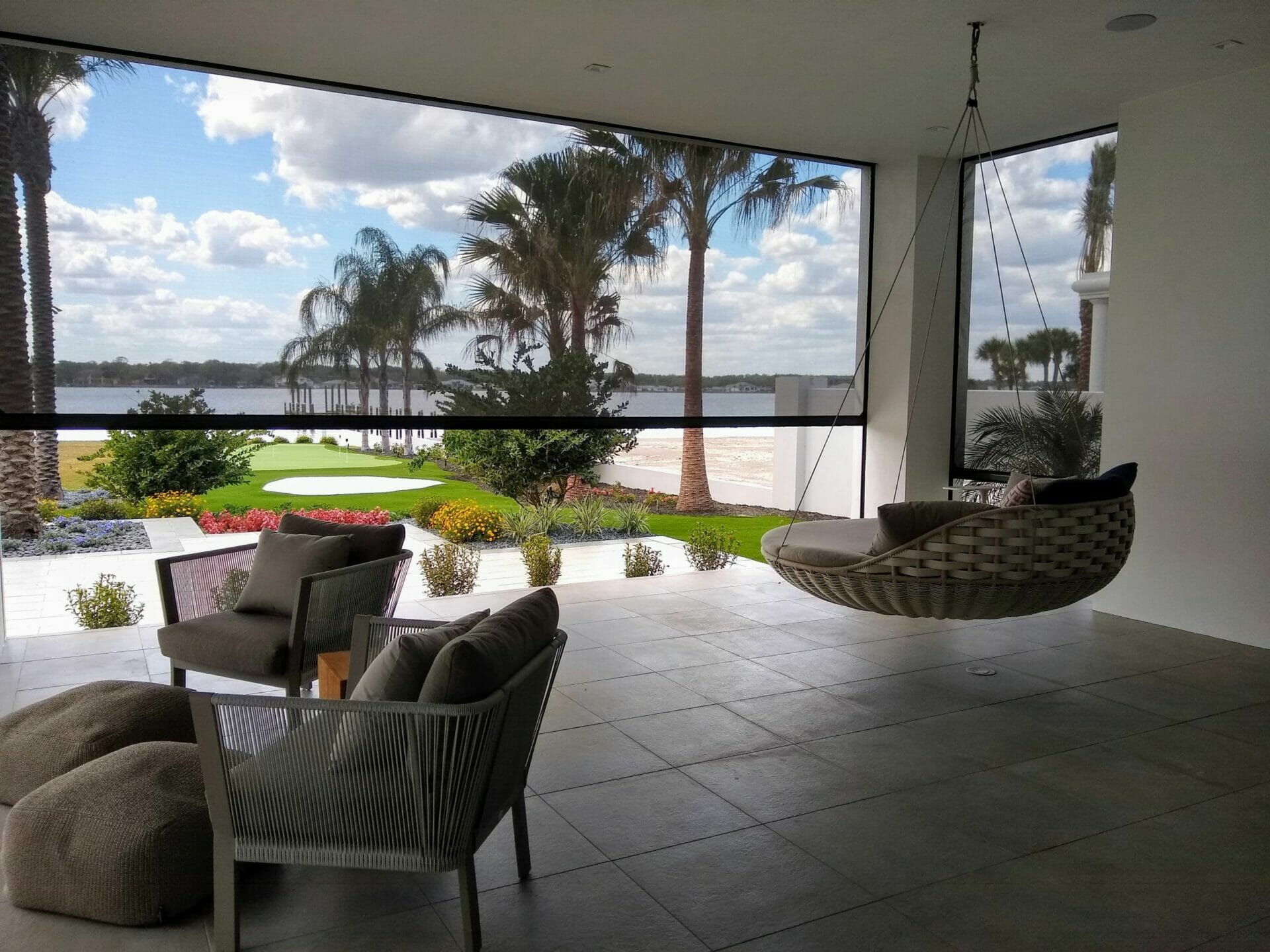 Motorized exterior patio shades on a Florida lanai