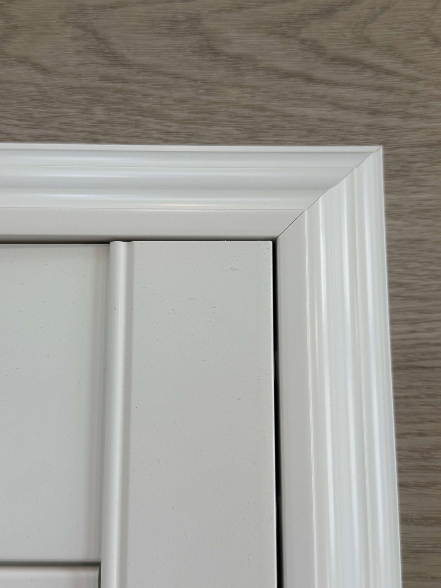 White door corner with ornate molding detail